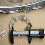 Rainbow Refractions and Metallic Reflections in Crystal Light Play