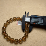 Texture Comparison Between Yellow Phantom Bracelet and Terracotta Sandstone