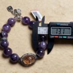 Texture Contrast Between Amethyst Color Zones and Rutilated Quartz Metallic Luster