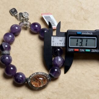 Texture Contrast Between Amethyst Color Zones and Rutilated Quartz Metallic Luster