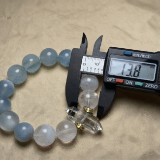 Winter Scene Composition with Bracelet, Ice Crystals and Snowflakes
