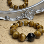 Bracelet Against Water Background Showing Elemental Resonance