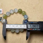 Bracelet Suspended to Show Natural Stone Draping Arc