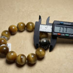 Dynamic Light Play on Three Stones During Wrist Movement