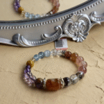 Ghost crystal bracelet set featuring white, red, green and purple varieties showing unique inclusions and formations