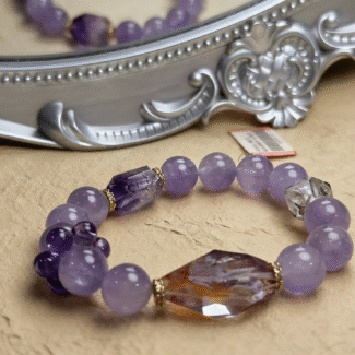 Herkimer diamond bracelet sparkling in sunlight, transparent double-terminated crystals on crystal cluster