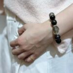 Herkimer diamond bracelet sparkling in sunlight, transparent crystals with perfect natural faceting