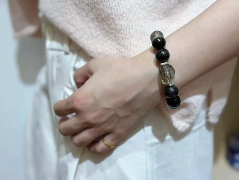 Herkimer diamond bracelet sparkling in sunlight, transparent crystals with perfect natural faceting