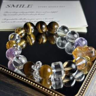 Detailed close-up of a wood fossil bracelet with dynamic patterns, set against a warm orange-red background to symbolize the fire element in Five Elements philosophy.