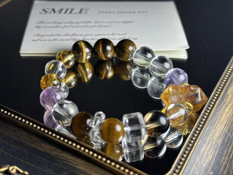Detailed close-up of a wood fossil bracelet with dynamic patterns, set against a warm orange-red background to symbolize the fire element in Five Elements philosophy.