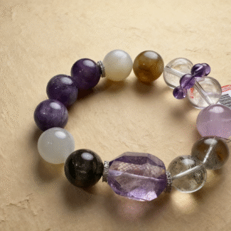 White ghost crystal bracelet showing mysterious inner landscapes and phantom formations